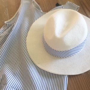 White fedora hat with blue stripes